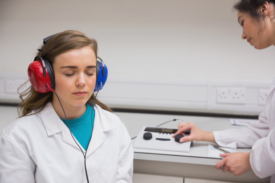 Student doing a hearing test at the university